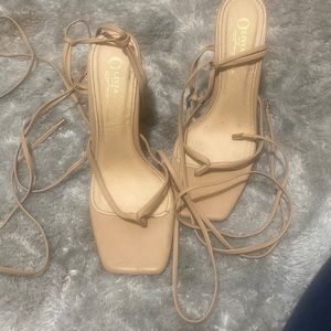 Crème lace up heels